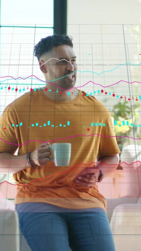 Vertical video: Man sipping mug and tapping phone at home demoing tech graphs Stock Footage 334297501