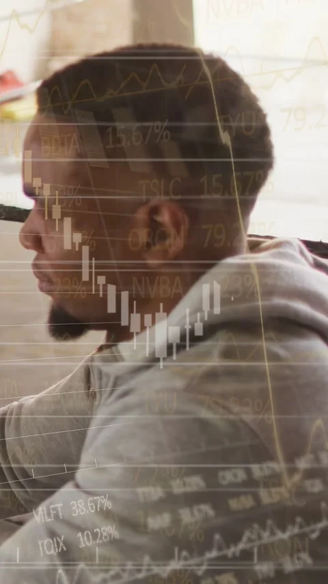Vertical video: Man sitting desk monitoring finance data updating watching Stock Footage 340133589