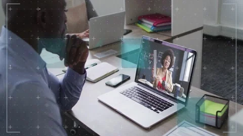 Vertical video: Man sitting at laptop, host showing doc for business, UI layers Stock Footage 333154326