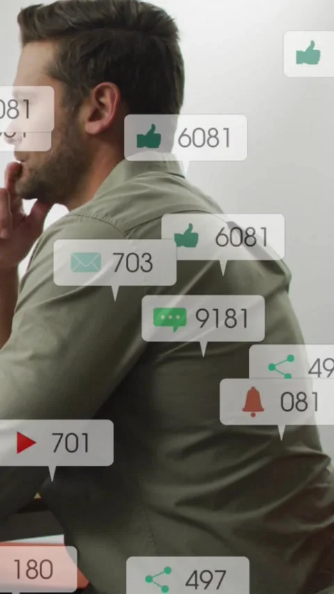 Vertical video: Man sitting profile notifications stacking over face then fading Stock Footage 334602610