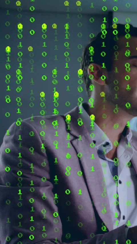 Vertical video: Man sitting right, green code falling, hiding face, turning head Vídeos de archivo 329962141