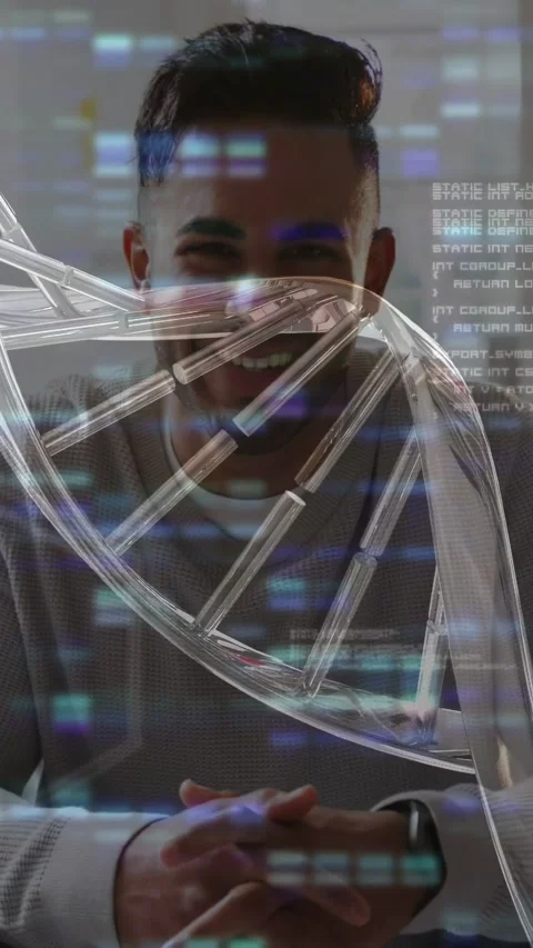 Vertical video: Man sitting at table reacting to DNA helix appearing, smiling Stock Footage 333289255