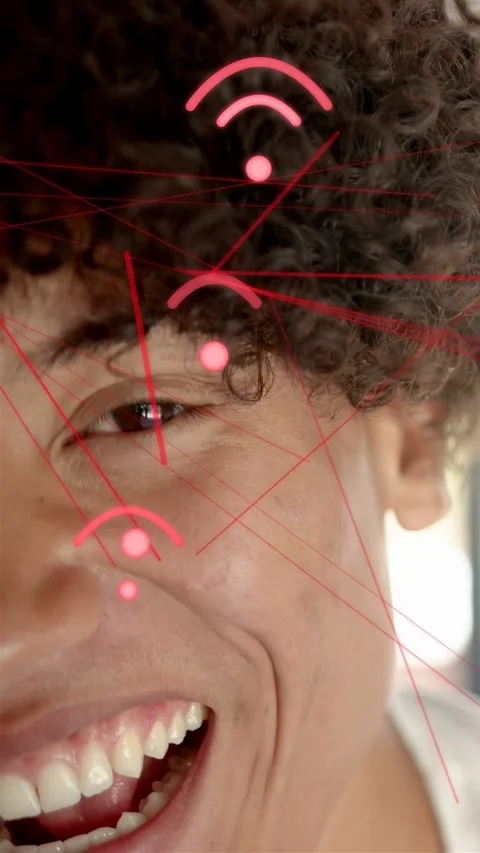 Vertical video: Man smiling into laugh, showcasing pink AR tech overlay aligning Stock Footage 333632899