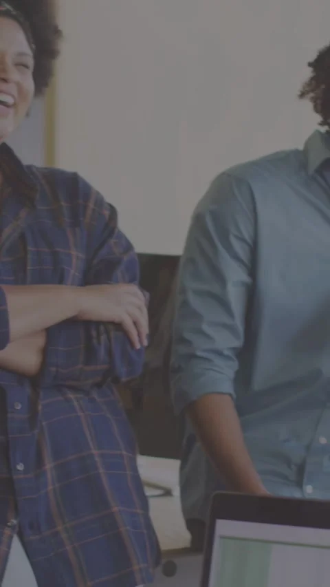 Vertical video: Man standing, presenting data, team smiling as animated chart 스톡 동영상 334046772