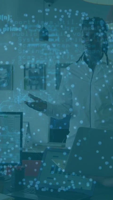Vertical video: Man starting gestures and explaining tech data near desk, Stock Footage 333527738