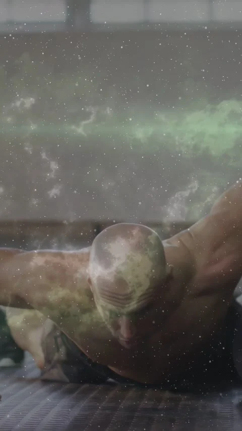 Vertical video: Man starting low, launching pushups, building power as green Stock Footage 334604550