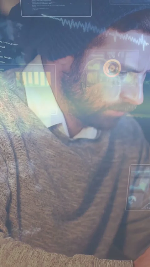 Vertical video: Man starting notes review at desk, holographic code and charts Stock Footage 334391517