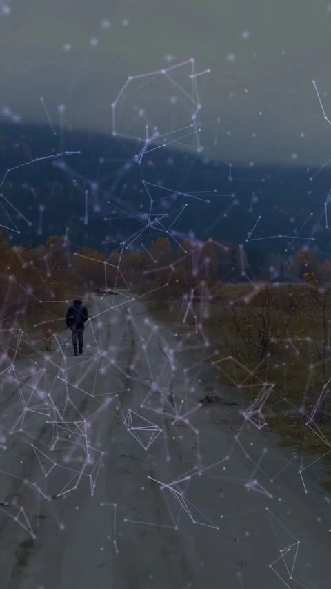 Vertical video: Man starting walk along rural road toward treeline, tech nodes Video stock 333954102