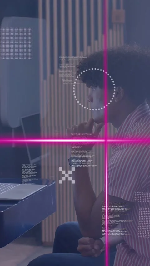 Vertical video: Man studying laptop while tech code starting, magenta lines Stock Footage 334792638