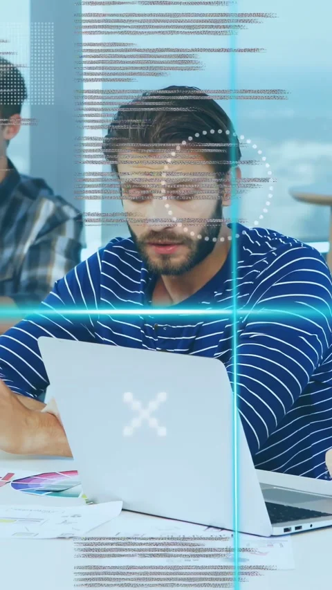 Vertical video: Man studying laptop charts after peer pointing, following Stock Footage 335264270