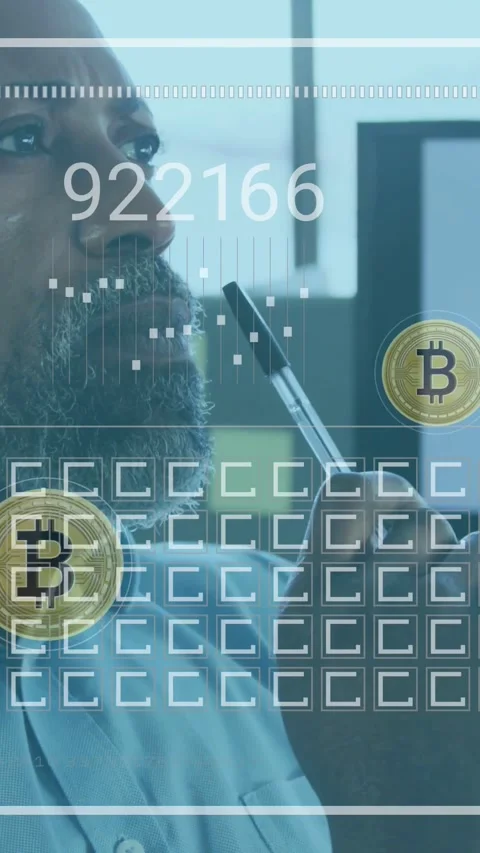 Vertical video: Man studying screen, data shifting and crypto coins crossing Stock Footage 334387253