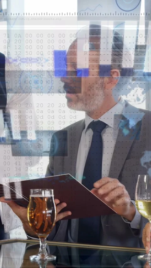 Vertical video: Man in suit opening menu, reading for business while AR bar Stock Footage 332747718