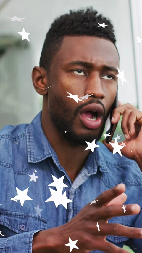 Vertical video: Man taking tech call, holding phone, handling issue while white Stock Footage 333650316