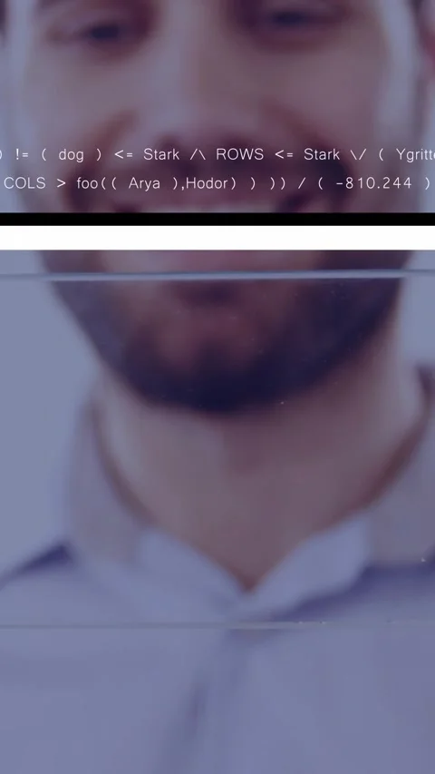 Vertical video: Man tapping clear glass, bringing up code overlays and smiling Stock Footage 328633201