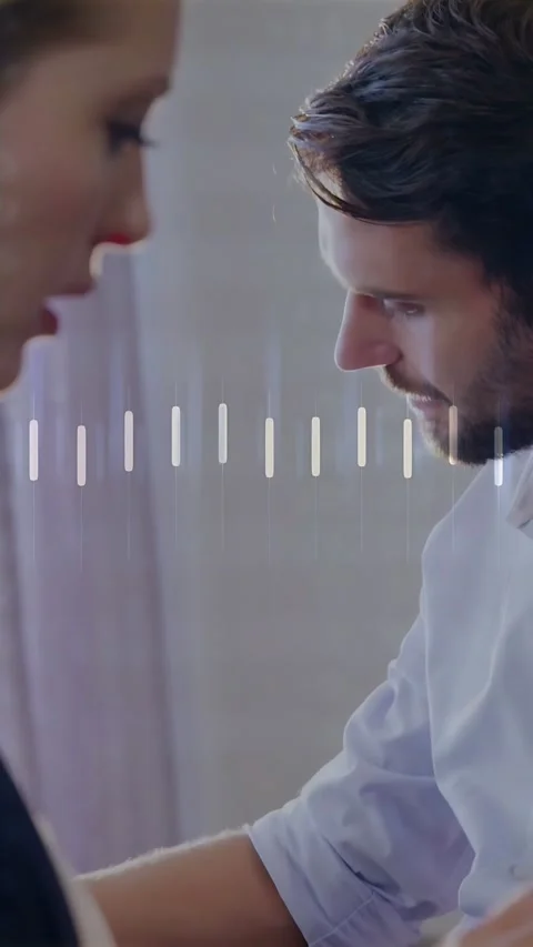 Vertical video: Man tapping device, starting audio bars, checking tech data as Stock Footage 333259705