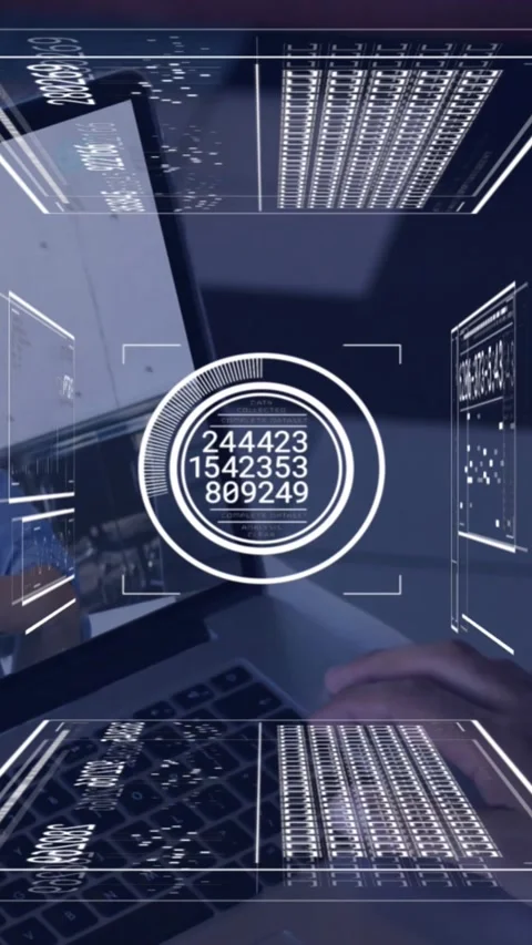Vertical video: Man tapping laptop trackpad, causing HUD ring cycling codes Stock Footage 328349998