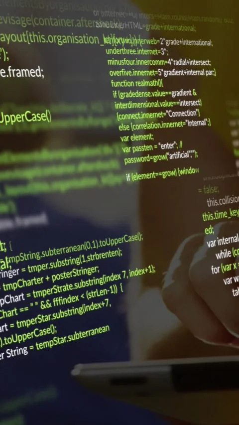 Vertical video: Man tapping pad and swiping bringing green code overlay over Stock Footage 330509828