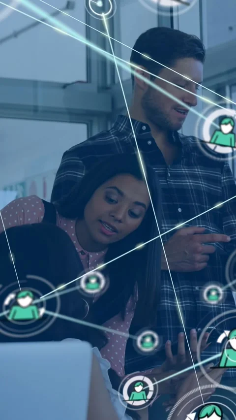 Vertical video: Man tapping phone and team tapping tablet, expanding network Stock Footage 329913376