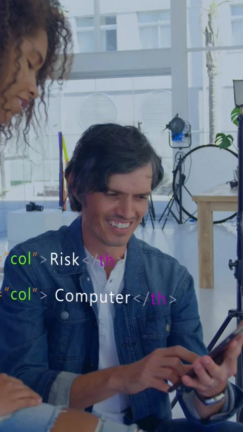 Vertical video: Man tapping phone, woman watching, running app test, code Stock Footage 330429960