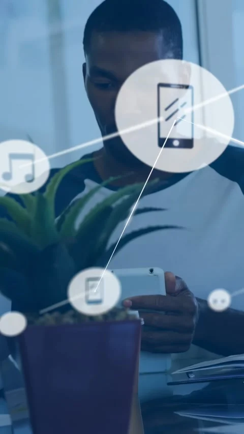 Vertical video: Man tapping phone, tech and music icons forming web, obscuring Stock Footage 331047255