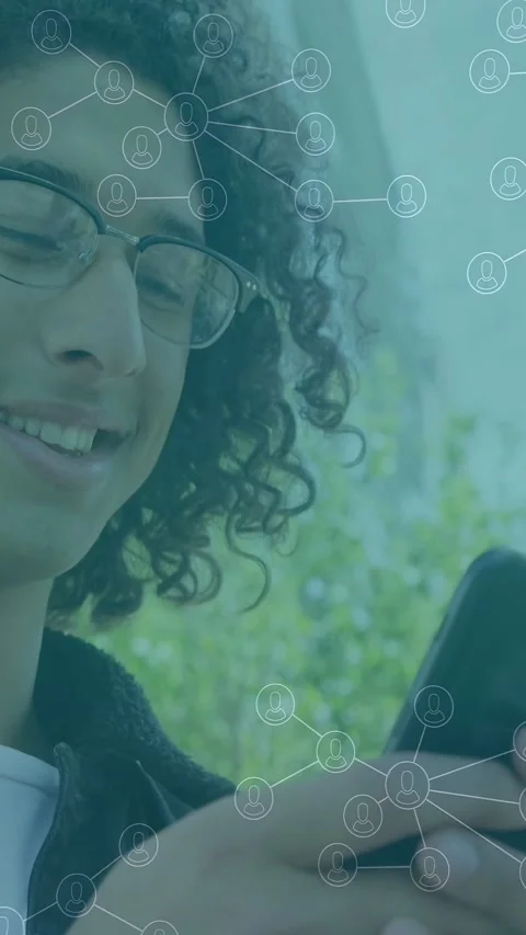 Vertical video: Man tapping phone screen, activating node overlay, checking Stock Footage 333109370