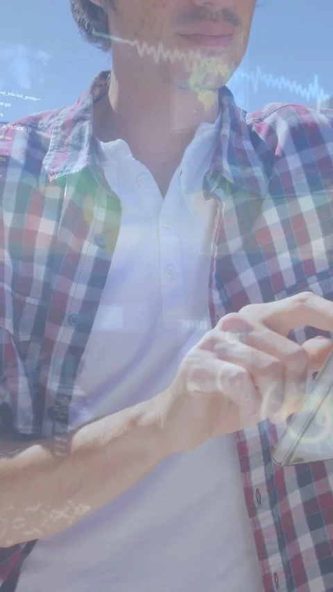 Vertical video: Man tapping phone, loading HUD waves, code overlays while Stock Footage 333480294