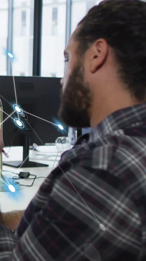 Vertical video: Man tapping phone, calling AR nodes forming pattern, testing Stock Footage 333913227