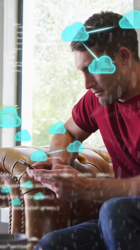 Vertical video: Man tapping phone starting IT cloud code overlay growing round Stock Footage 334128155