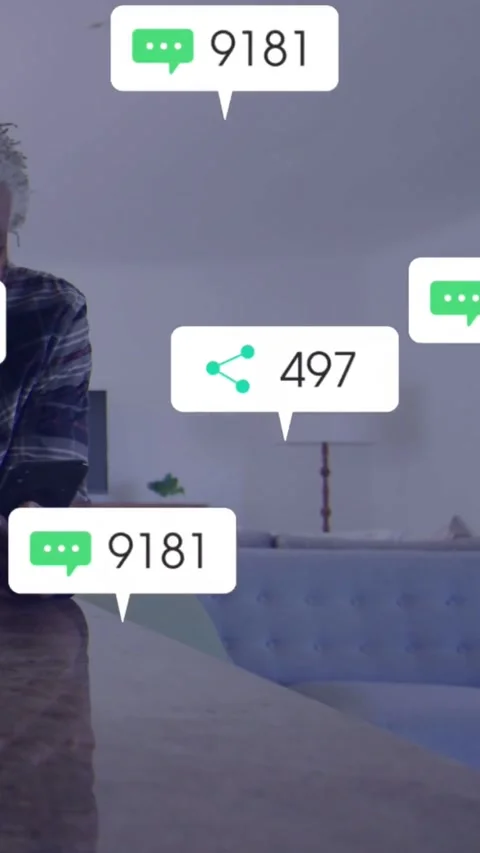 Vertical video: Man tapping phone watching social bubbles showing rising counts Stock Footage 334187600