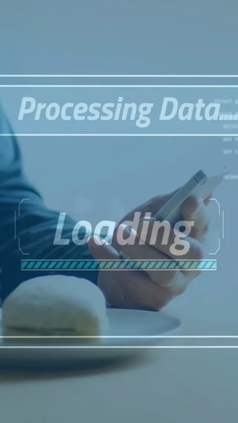 Vertical video: Man tapping phone on table, starting tech data loading with HUD Stock Footage 334317462