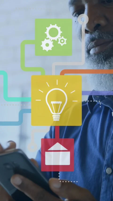 Vertical video: Man tapping phone, scrolling, making lightbulb gear mail icons Stock Footage 334392129