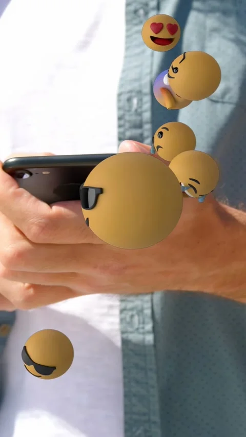 Vertical video: Man tapping phone and causing animated tech emojis growing, Stock Footage 335355556
