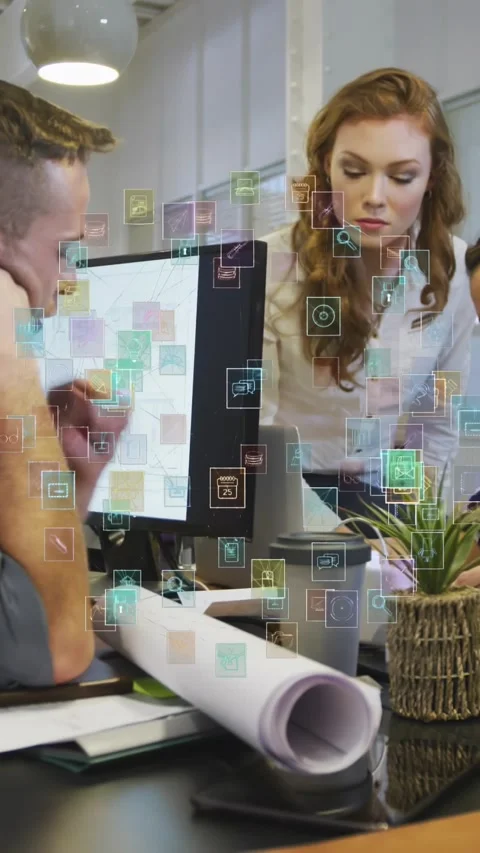 Vertical video: Man tapping plans, colleague leaning, tap spawning icons over Stock Footage 328308779