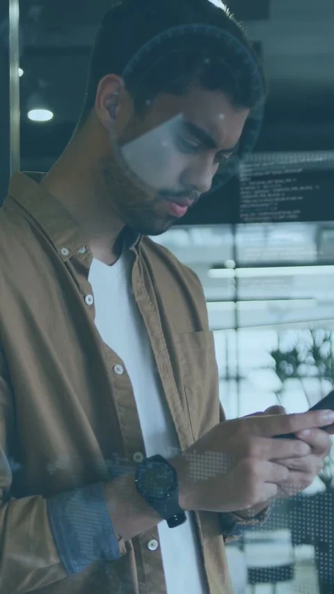 Vertical video: Man tapping smartphone, activating AR code panels overlaying Stock Footage 333542159