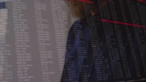 Vertical video: Man tapping tablet activating code reflection, red lines marking Stock Footage 330330807