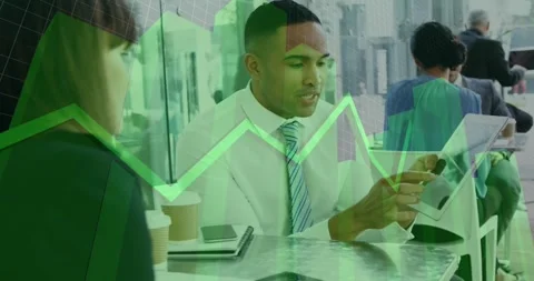 Vertical video: Man tapping tablet and presenting finance data in cafe, green Stock Footage 330379823