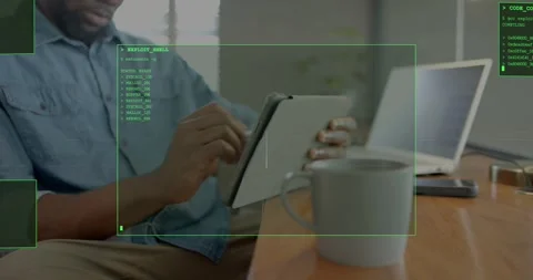Vertical video: Man tapping tablet and swiping stylus at desk, initiating Stock Footage 330955831