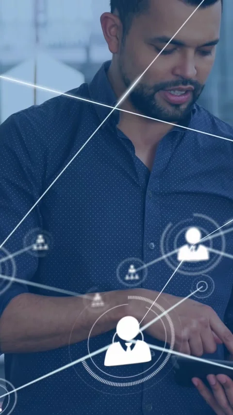 Vertical video: Man tapping tablet, launching tech contact icons overlaying Stock Footage 330982538