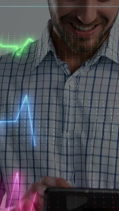 Vertical video: Man tapping tablet screen for tech showing dotted grid aligning Stock Footage 332317803