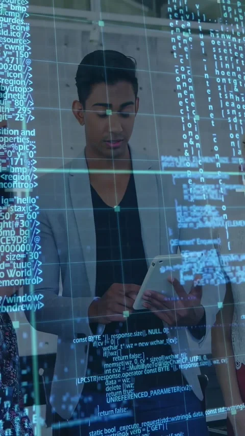 Vertical video: Man tapping tablet showing IT data to team as blue code Stock Footage 333157392