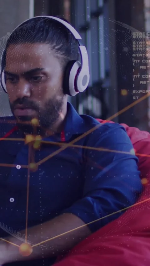 Vertical video: Man tapping tablet, looking right, checking tech, network Stock Footage 334600990