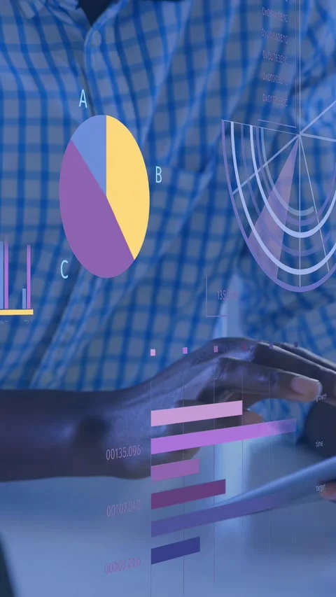 Vertical video: Man tapping tablet and swiping, updating tech pie and radial Stock Footage 335264152