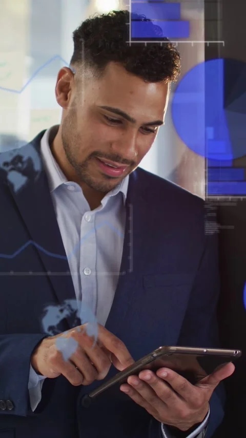 Vertical video: Man tapping tablet by window, creating business data overlays Stock Footage 335507566
