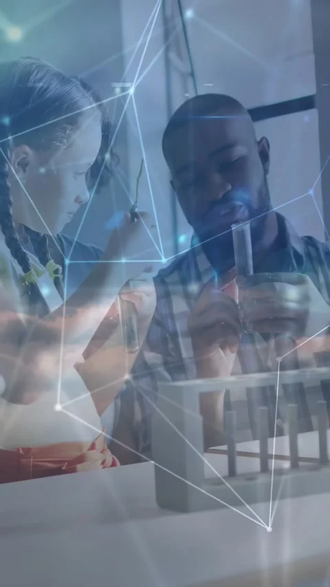 Vertical video: Man teaching tube use in STEM, hand urging girl placing in rack Stock Footage 334317825