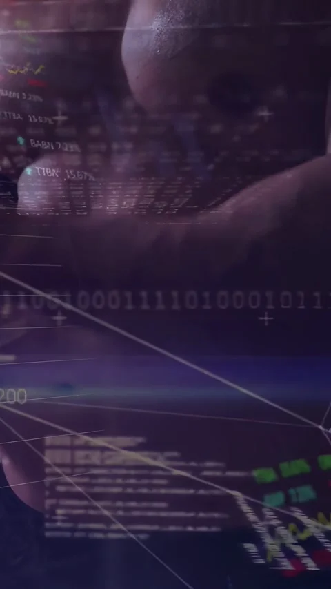 Vertical video: Man touching keyboard and typing while code, binary and charts Stock Footage 334317297