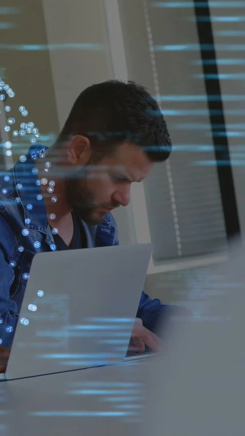 Vertical video: Man touching keys and typing in tech office, reviewing code Stock Footage 333289482