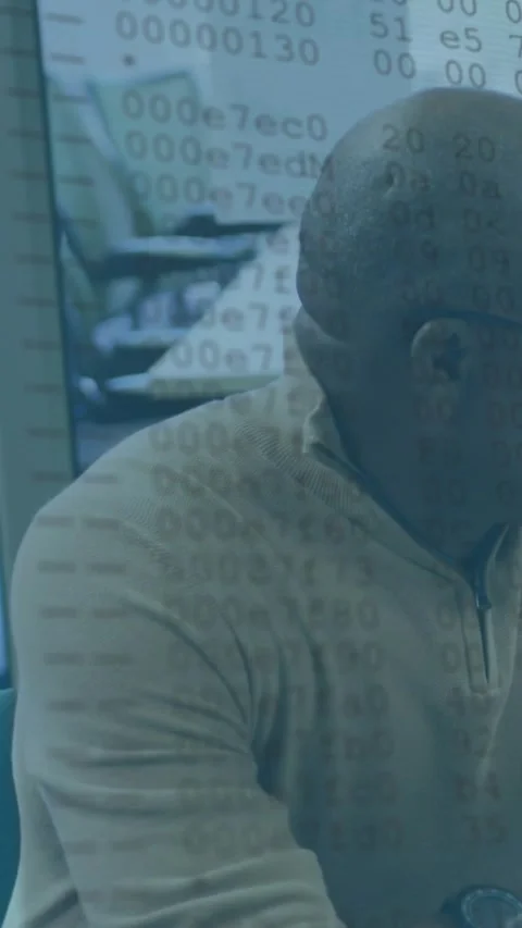 Vertical video: Man turning head in biz while data feed causing hex overlay Stock Footage 332278477