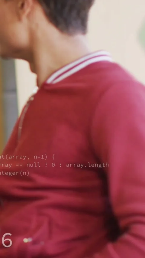 Vertical video: Man turning left causing hex icons, code overlaying torso, Stock Footage 331569606