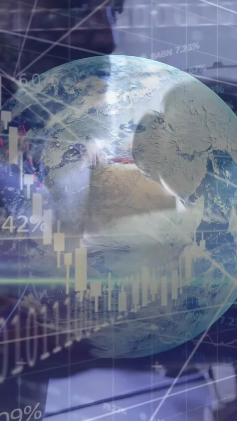 Vertical video: Man typing keys, causing globe and finance charts updating and Stock Footage 330982606