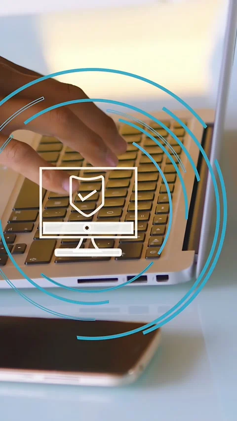 Vertical video: Man typing keys starting shield over hands, pulsing blue rings Stock Footage 334836729